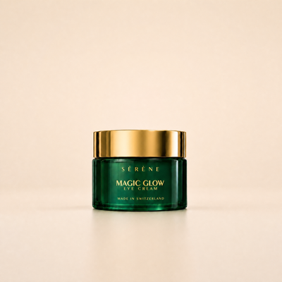 Green jar of Séréne Magic Glow Eye Cream with gold lid on a beige background